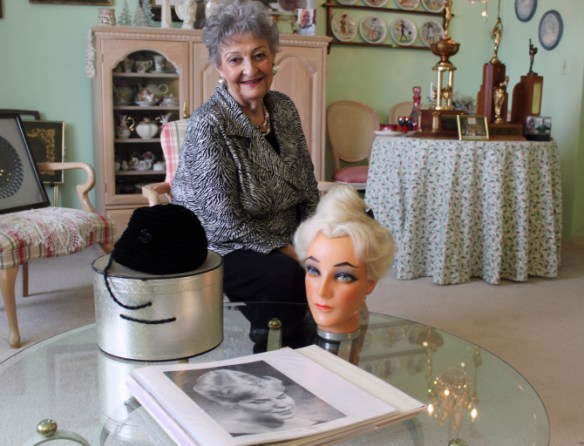 In this photo taken Jan. 19, 2011, retired hairstylist Margaret Vinci Heldt, 92, is seen at her apartment in Elmhurst, Ill. Heldt developed "the beehive" hairdo when Modern Beauty Shop magazine was looking for a new design, something new and different to feature in its February 1960 issue. The black velvet hat on the table was the inspiration for the hairdo. (AP Photo/Caryn Rousseau)